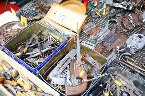 Old tools and hardware on the flea market. Stock Photos