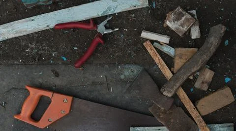 Old tools are lying on the ground. Construction tools for home repair and con Foto stock