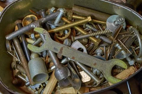 Old tools, nails, screws, nuts, wrenches Stock Photos