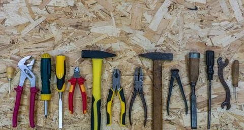 Old tools near modern tools. Concept: equipment upgrade. Foto stock