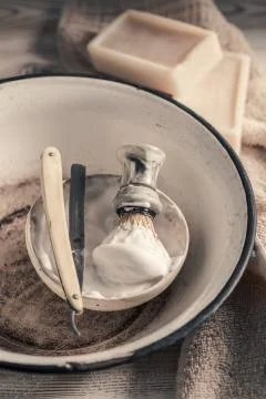 Old tools for shave. Sharp razor, soap and brush Stock Photos