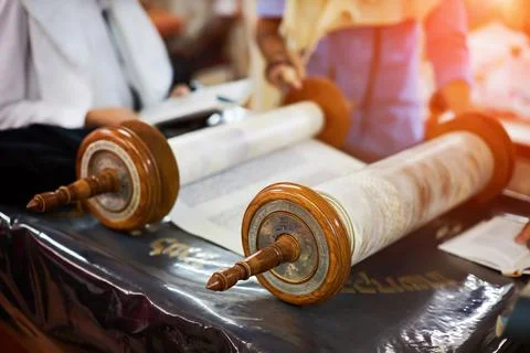 Old Torah scroll book close up detail Jewish books of Tora in the synagogue Stock Photos