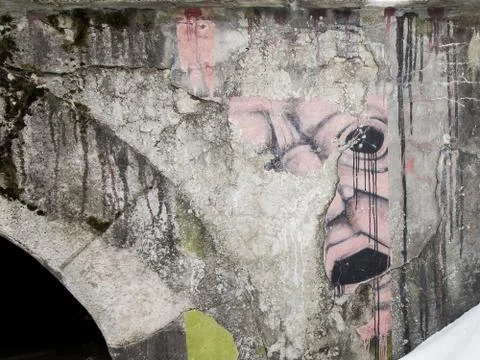 Old torn advertisement background. the remains of the picture on the wall Stock Photos