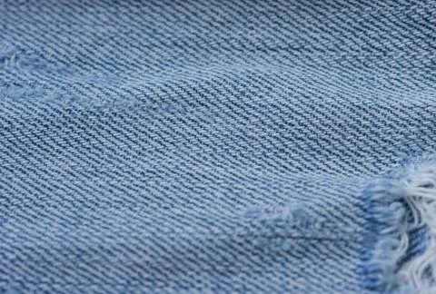 Old torn jeans texture. Textile background Stock Photos
