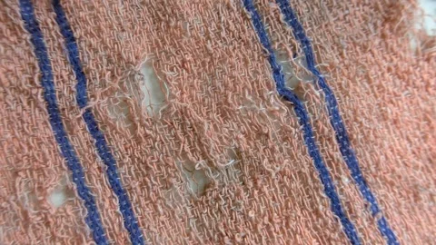 Old torn rag cloth close up view at kitchen table Video stock 249663688