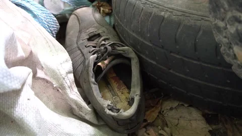 Old torn shoe Video stock 159867324