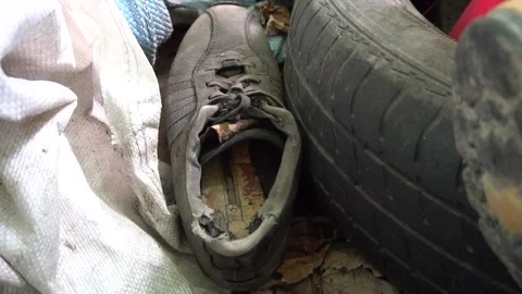 Old torn sneaker Stock-Footage 159867403