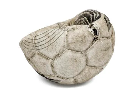 Old torn soccer ball, isolated on white background Stock Photos