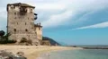Old tower at the beach in Ouranoupoli, Athos peninsula, Chalkidiki, Greece HD Footage