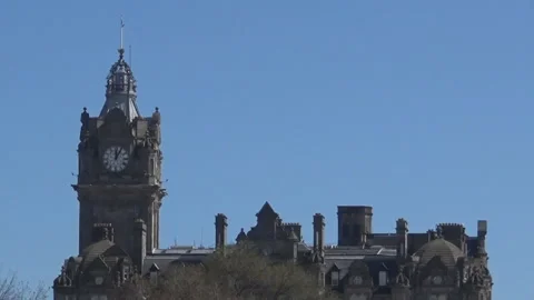 An old tower with clock in Edinbirgh Stock Footage 94623813