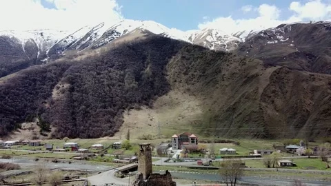 Old tower of Georgia with Mountain view Stock Footage 239748954
