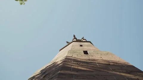 Old Tower Looking in the Blue Sky  Vídeos de archivo 166143773