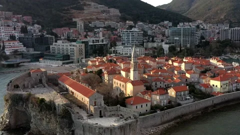 Old town of Budva from a drone at sunset. A historical place in Montenegro Stock Footage 152546871