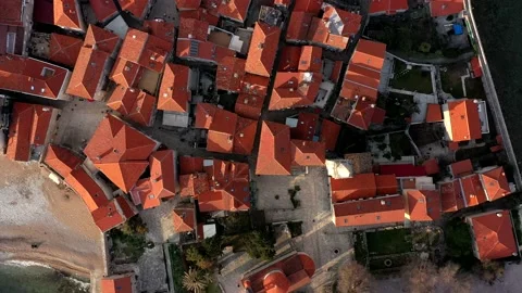 Old town of Budva from a height at sunset. A historical place in Montenegro Stock Footage 152557102