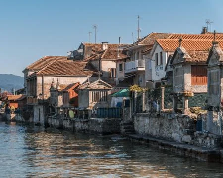 The old town of Combarro has the largest collection of horreos Stock Photos
