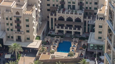 Old Town Island daytime timelapse Downtown Dubai blue swimming pool aerial Stock Footage 337945624