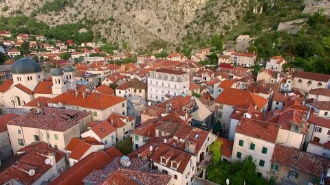 The Old Town of Kotor. Flying over the city. Aerial survey by a Stock Footage 76229891