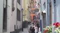 Old Town Narrow Street Cologne Residential Area Houses People Crowd Walk Visit HD Footage