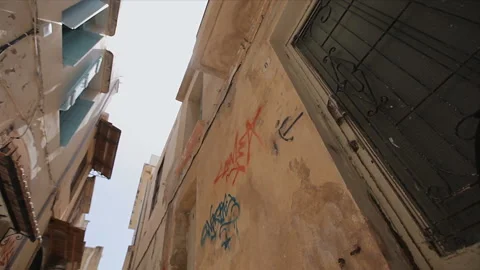 Old Town with narrow streets and old houses with graffiti Stock Footage 86474591