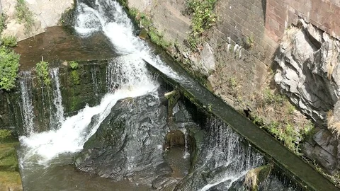 Old town part and Leuk River flowing and mills at Saarburg 動画素材 94589953