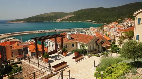 Old town with Red roofs and stone facade in Lustica Bay, Montenegro on the coast Video stock 201412603