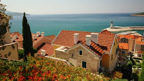 Old town with Red roofs and stone facade in Montenegro on the coast of Kotor Bay Video stock 201412775