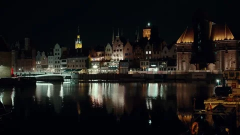 Old town reflected in the river at night Stock Footage 312208012