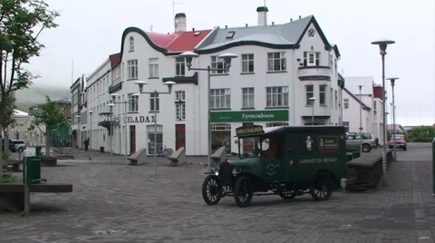 Old town square with an ancient classic car Stock Footage 37279489