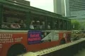 Old Town Trolley tour bus driving away Footage