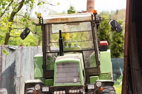 Old tractor at the barn Stock Photos