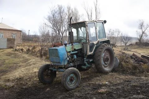 Old tractor in a field Stock Photos