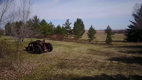 Old tractor parked Stock Footage 77715909