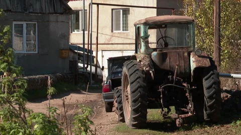 Old tractor, village image 7 Video stock 311646451