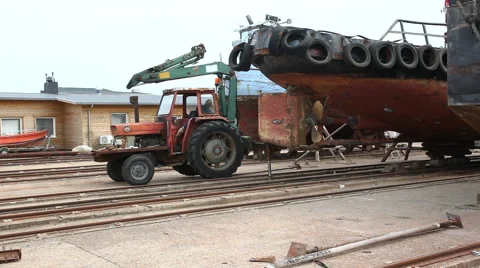 Old tractor working on the harbor Stock Footage 40694683