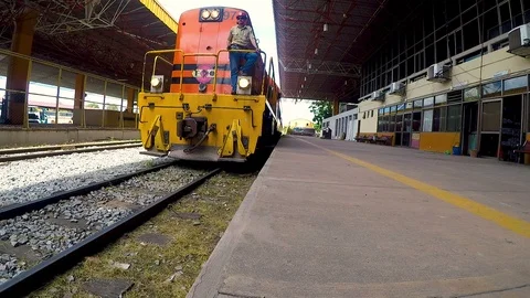 Old train arriving in station bell Stock Footage