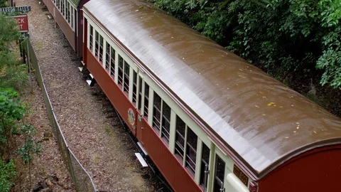 Old train heading along tracks Stock Footage 112367320