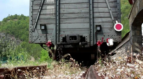 Old train leaving station Stock Footage 32282124