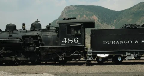 Old train in a mining town Stock Footage 92838086