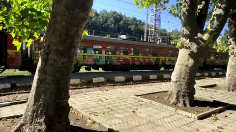 Old Train At The Station. A Beautiful Retro Colorful Train. Passenger Train. Stock Footage 149318598