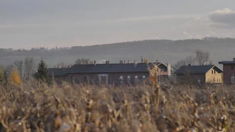 Old train station building from behind the cornfield 2 Stock Footage 244710486