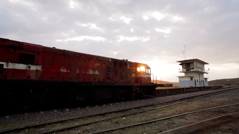 Old Train stopped against the sun Stock Footage 90230630