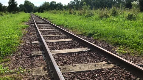 Old train tracks slow tilt up Stock Footage 93671056