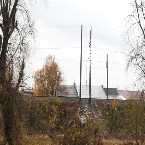 Old train transports cargo. Freight train moving on a rainy autumn day. Stock Footage 69369597