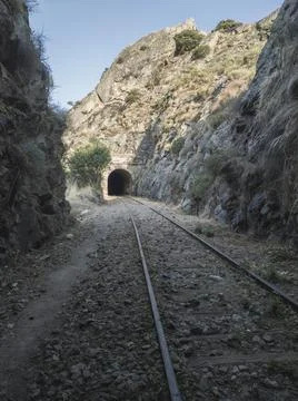 Old train tunnel through the mountains Stock Photos