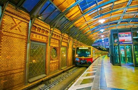 The old train of the U-bahn line arrives to the covered Hackescher Markt st.. Stock Photos