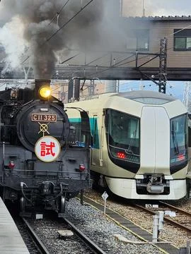Old Train versus modern train Stock Photos