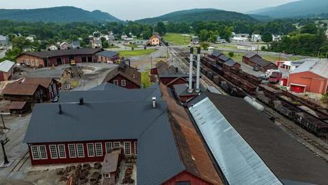 Old Train Yard and Buildings Seen From Above in Rural Area Stock-Fotos