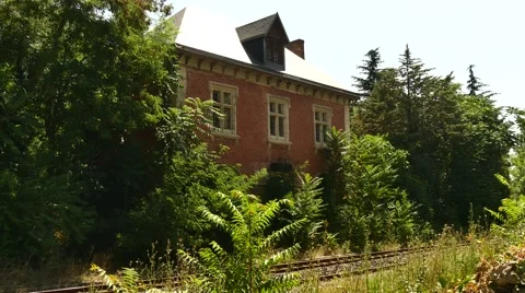 Old trainstation with trees 1 Stock Footage 54394105