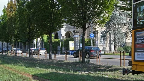 Old tram passing by in Milan 動画素材 132985070