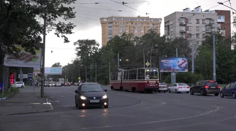 Old tram running in mixed traffic along Serdobolskaya Street Stock Footage 67468227